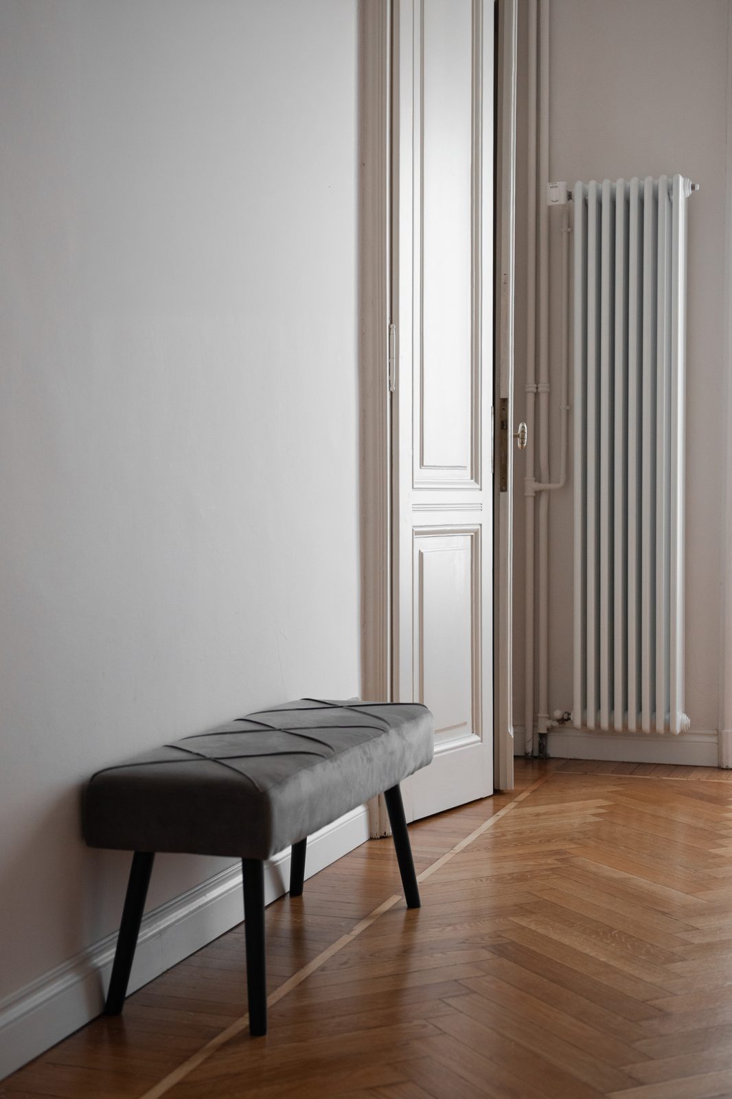A door standing open onto a quiet room